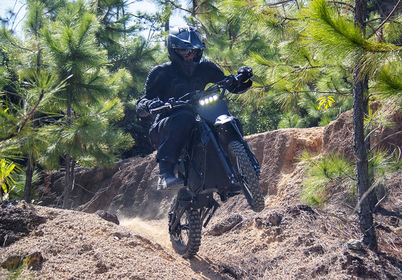 Ride the VIPCOO H3 electric dirt bike outside